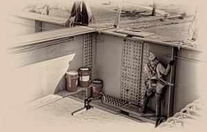 Trey Dewitt Ironworker working on edge girder as a new section of the Downtown Span is lifted into place for the Ohio River Bridges Project in Louisville KY, B&W Version